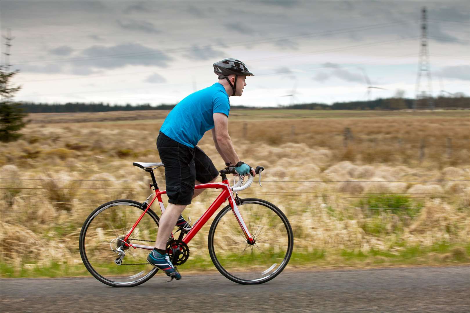 A cyclist training in the countryside.
