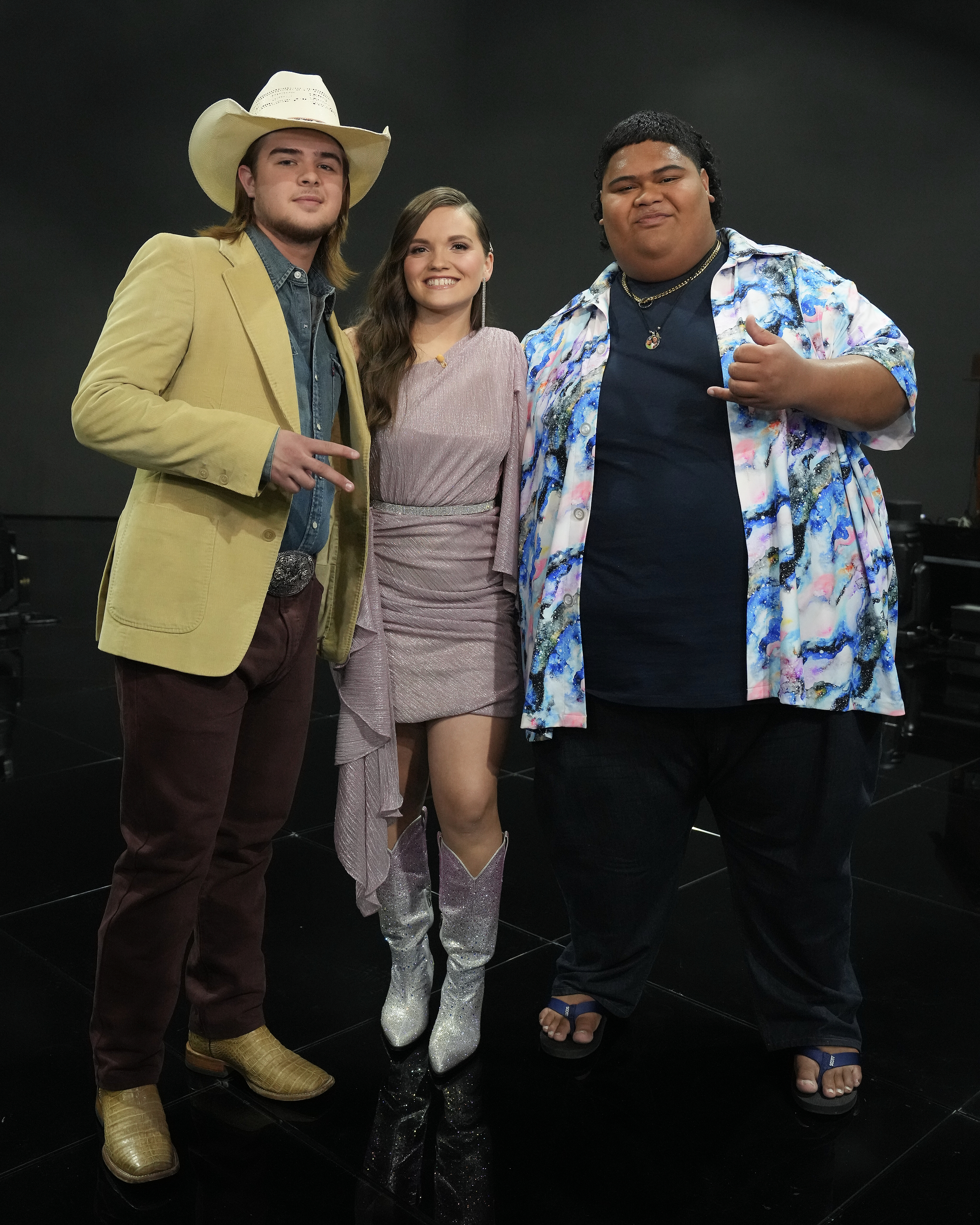 Colin took a photo with Megan Danielle and Iam Tongi