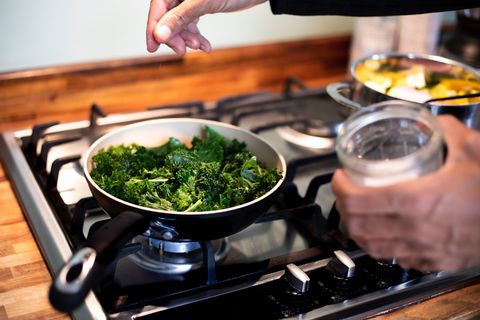 cooking sautéed kale with garlic and olive oil